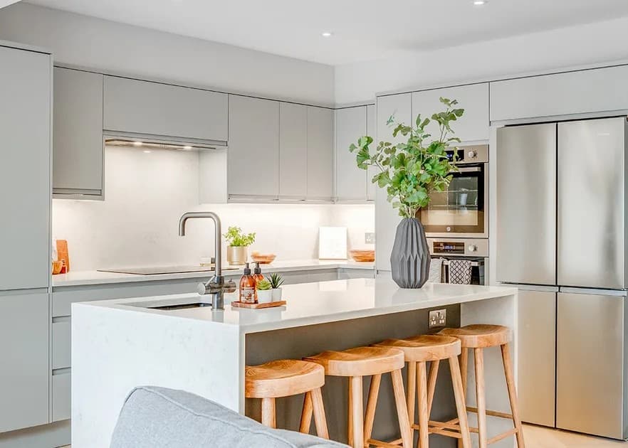 Professional kitchen renovation and remodeling services in Kensington MD - modern kitchen design with island and stainless steel appliances